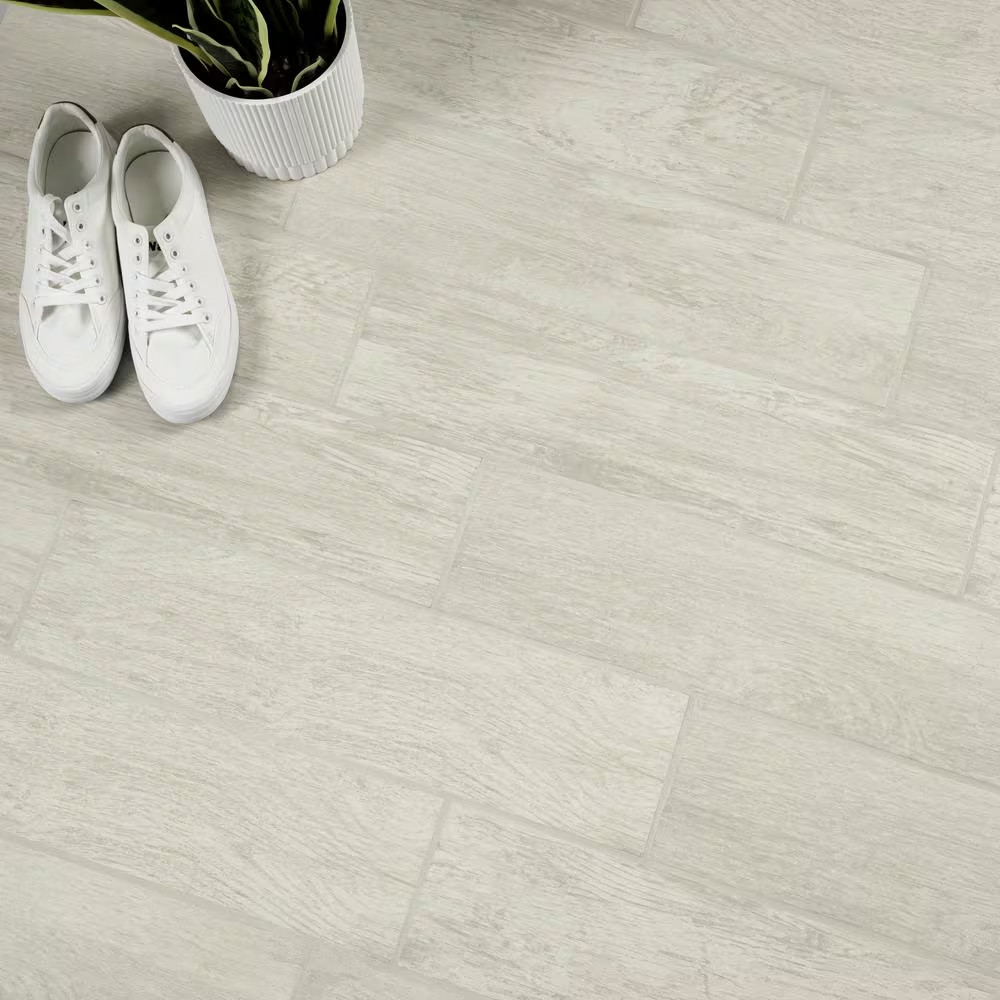 Capel Bianco 6 In. X 24 In. Matte Ceramic Wood Look Floor and Wall Tile (17 Sq.