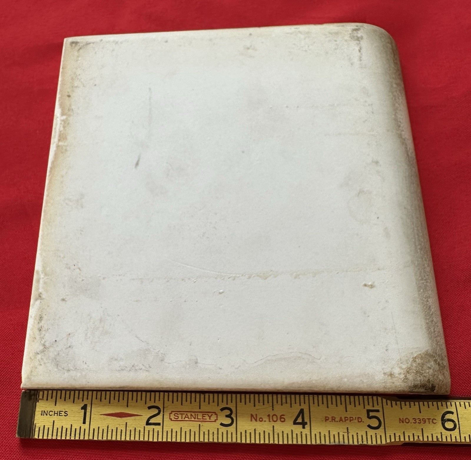 1 pc. Oatmeal Speckled Color: 6” X 6” Glossy Ceramic Cove Base Tile