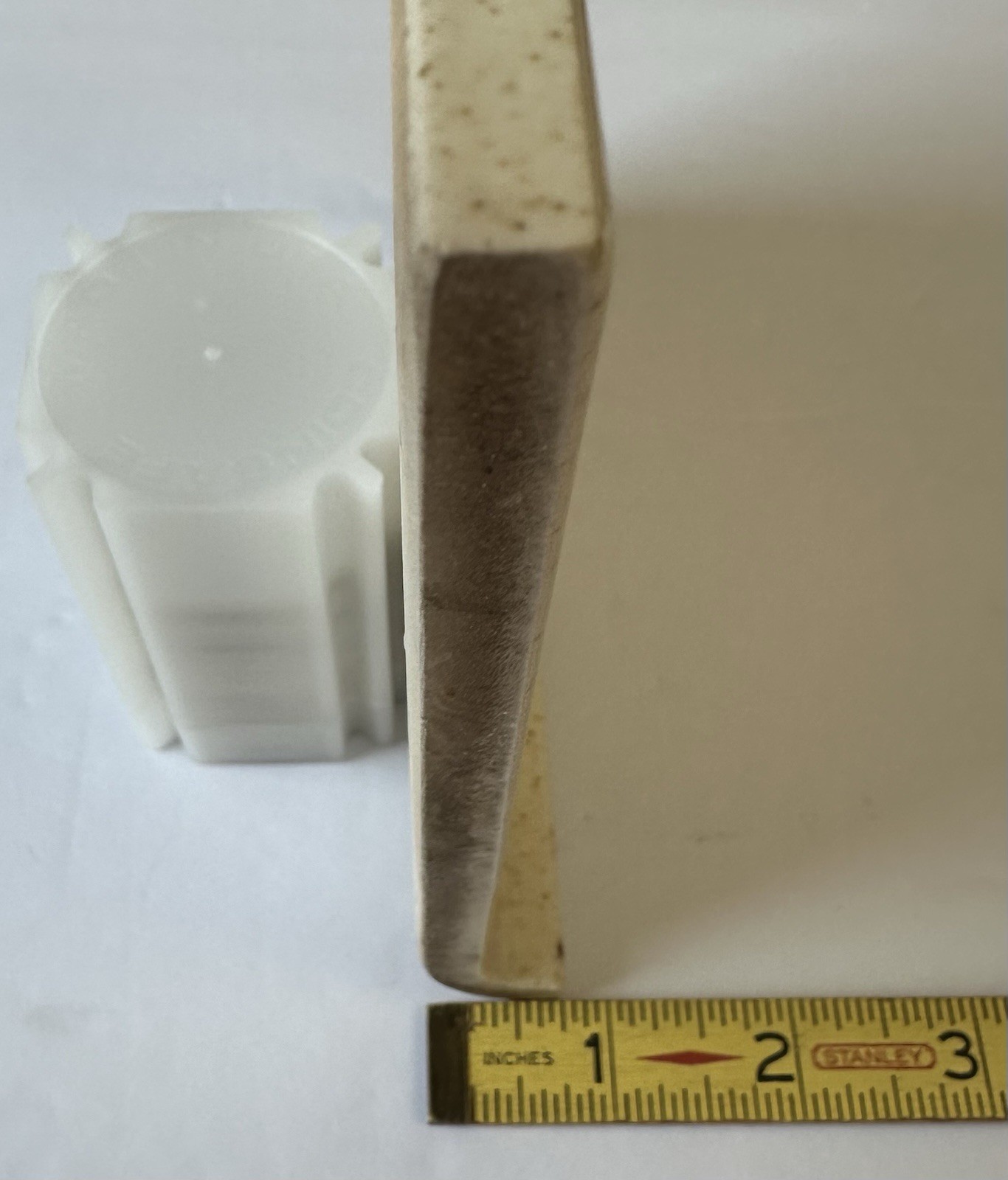 1 pc. Oatmeal Speckled Color: 6” X 6” Glossy Ceramic Cove Base Tile