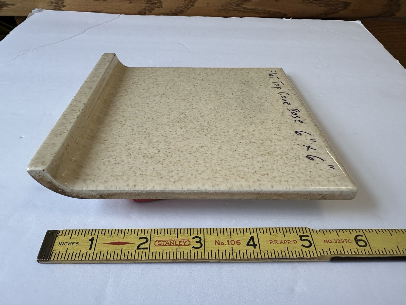 1 pc. Oatmeal Speckled Color: 6” X 6” Glossy Ceramic Cove Base Tile