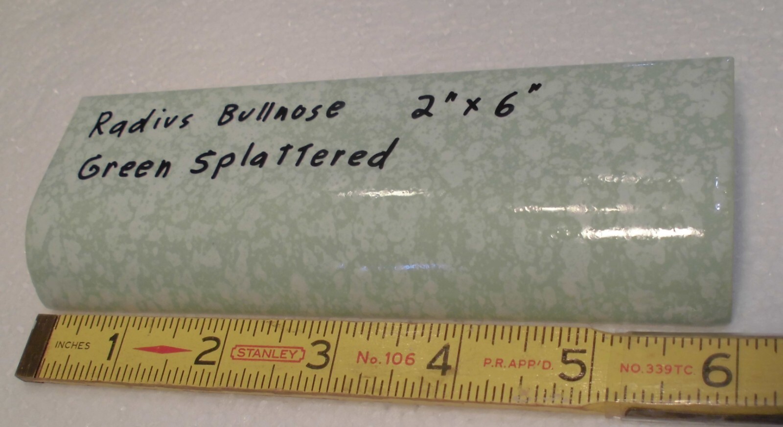 1 pc. “Pale Green Splattered” Ceramic Tile: 2″ X 6″ Glossy Radius Bullnose: NOS
