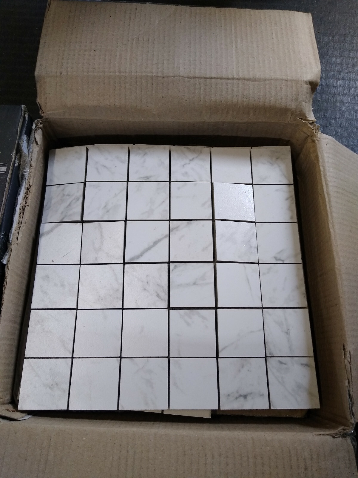 2in X 2in Mosaic Carrera style porcelain tile flooring, ≈ 22 sq. ft. New, never 