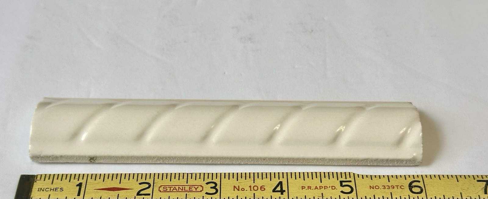 1 pc. Gloss Almond Ceramic Tile: Pencil – Liner – Sizzle: 6″ X 1-1/4″ Rope
