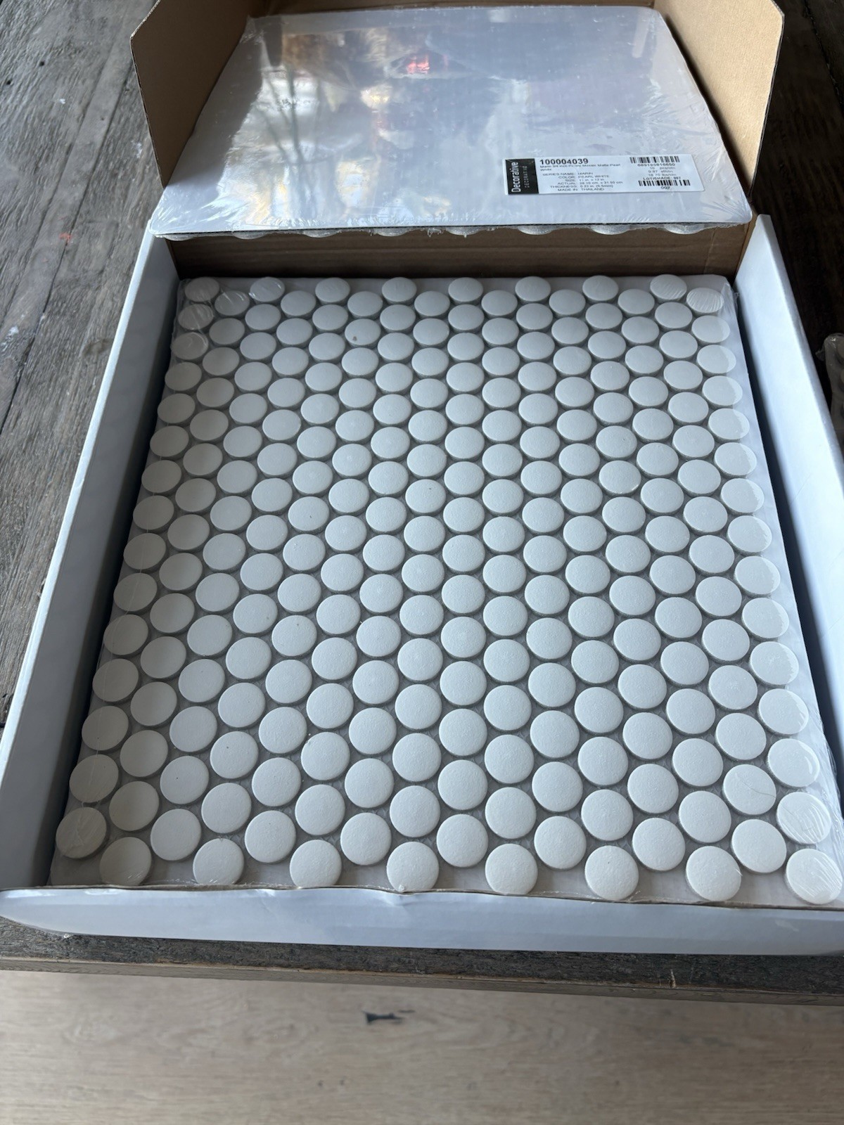 Marin 3/4 in. Penny Round Matte Porcelain in Pearl White. Bedrosians 8 Sheets