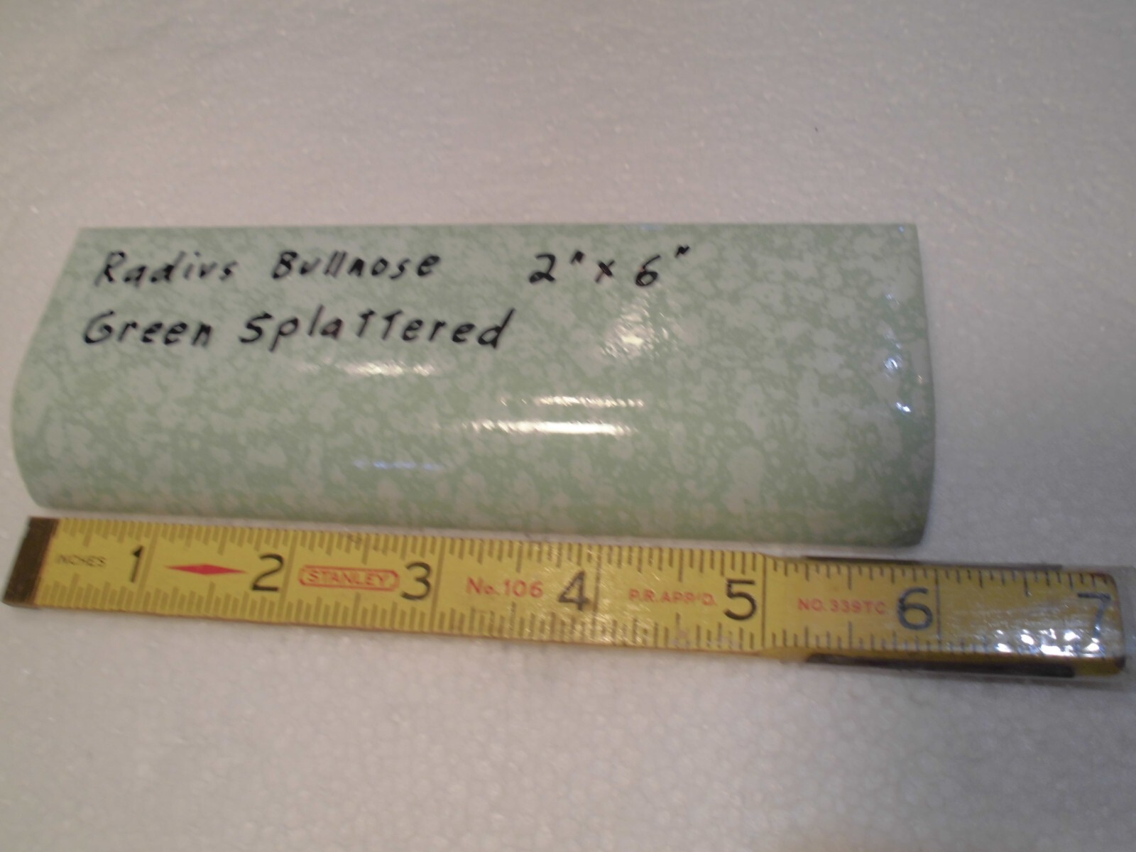 1 pc. “Pale Green Splattered” Ceramic Tile: 2″ X 6″ Glossy Radius Bullnose: NOS