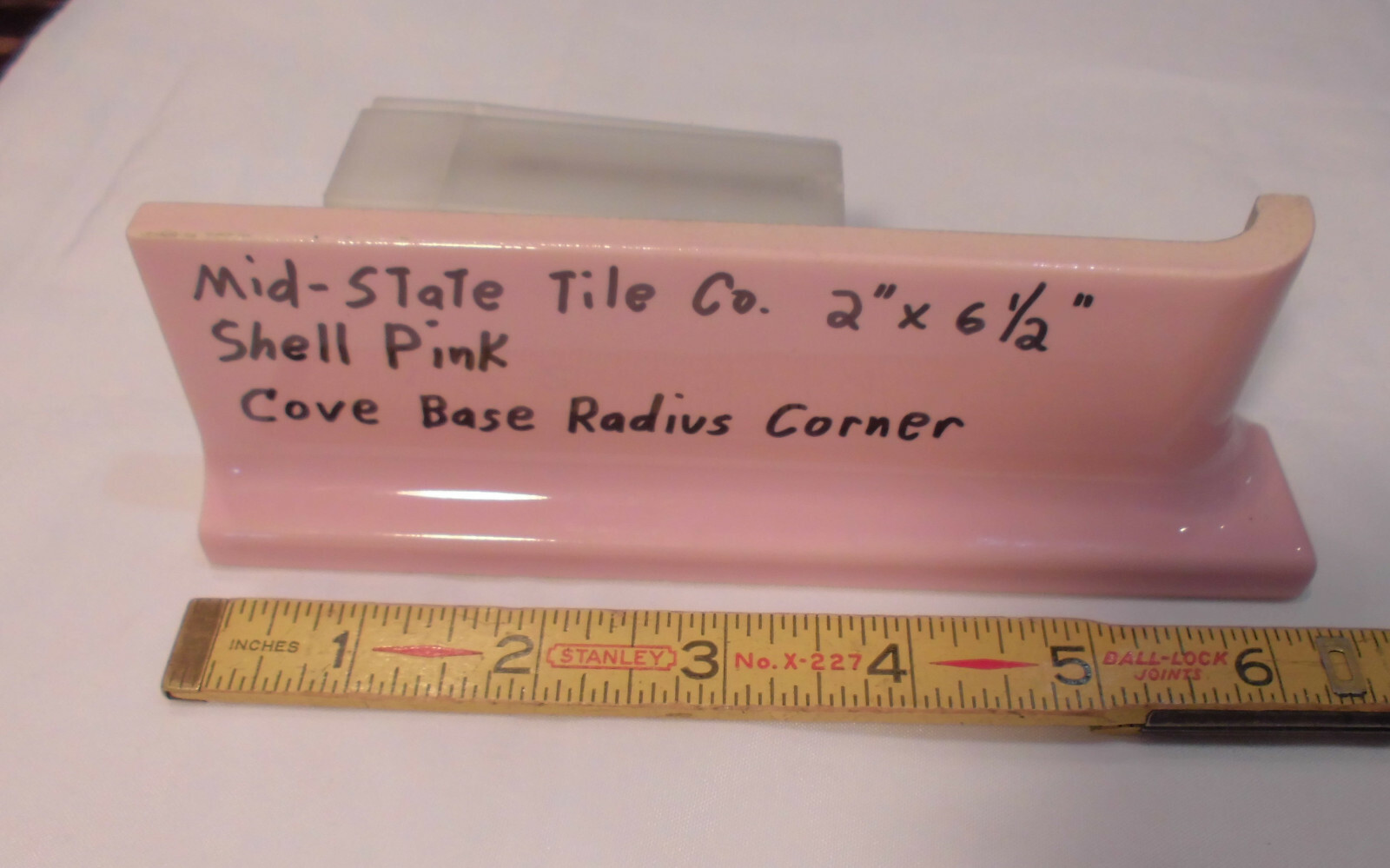 1 pc. Glossy Shell Pink 2” X 6-1/2” Ceramic Radius Cove Base Tile; Flat Top, R