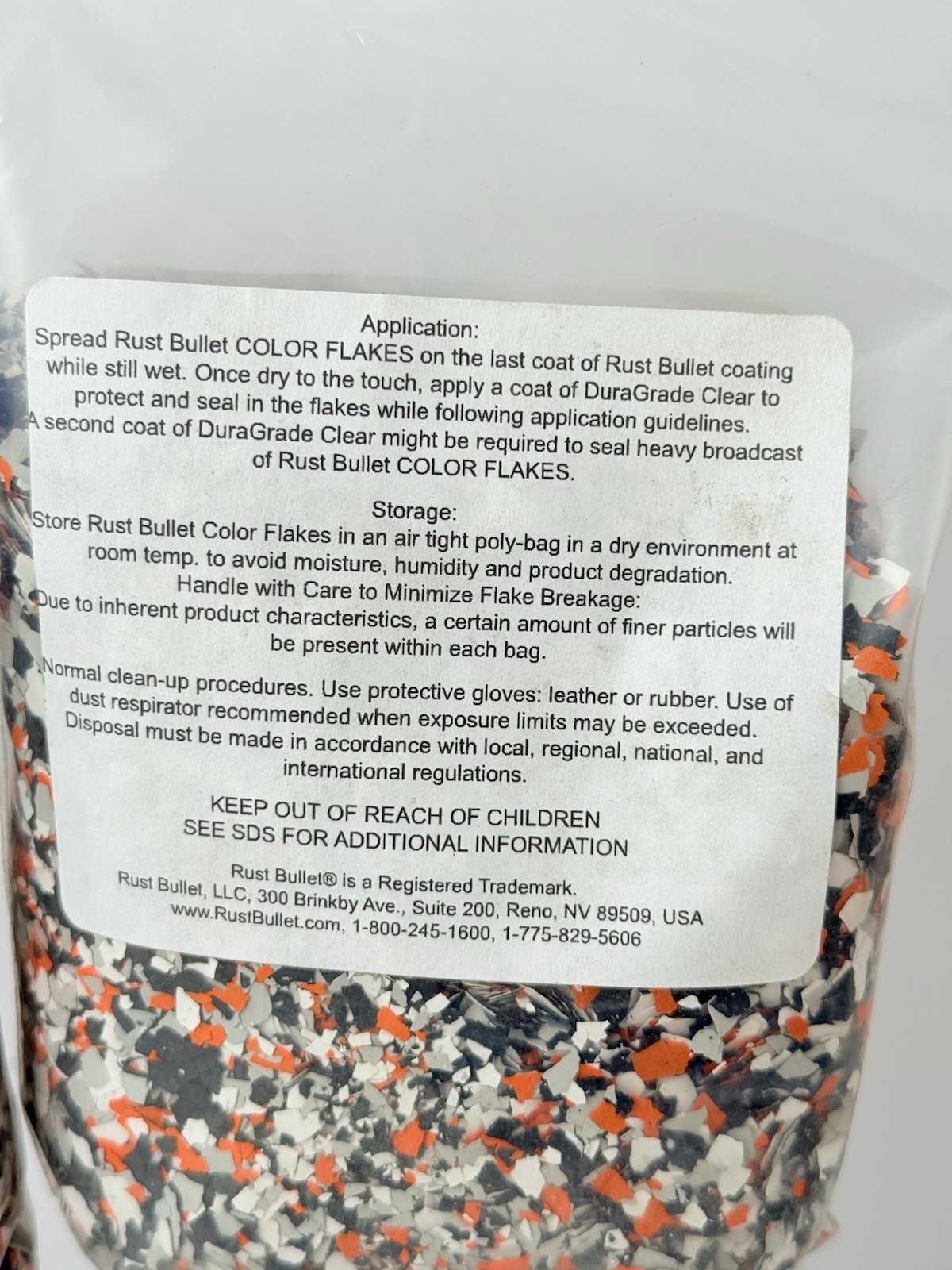 Rust Bullet Color Flake 1/4” Harley Blend Customized Concrete Floor Black Orange