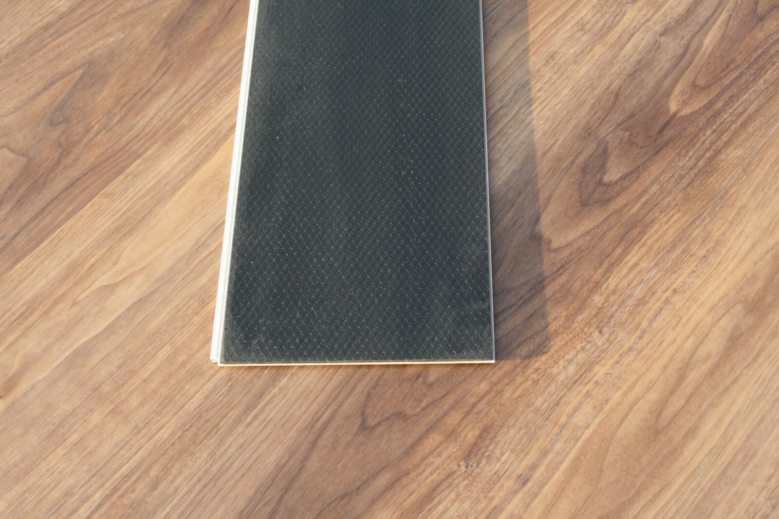 Claro Luxury Vinyl SPC Plank With 1mm IXPE Rubber Pad Sample