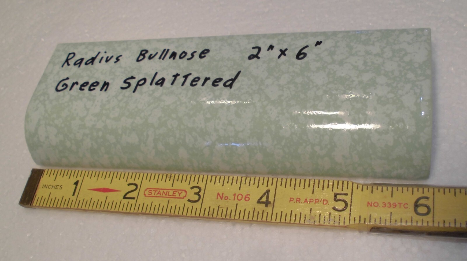 1 pc. “Pale Green Splattered” Ceramic Tile: 2″ X 6″ Glossy Radius Bullnose: NOS