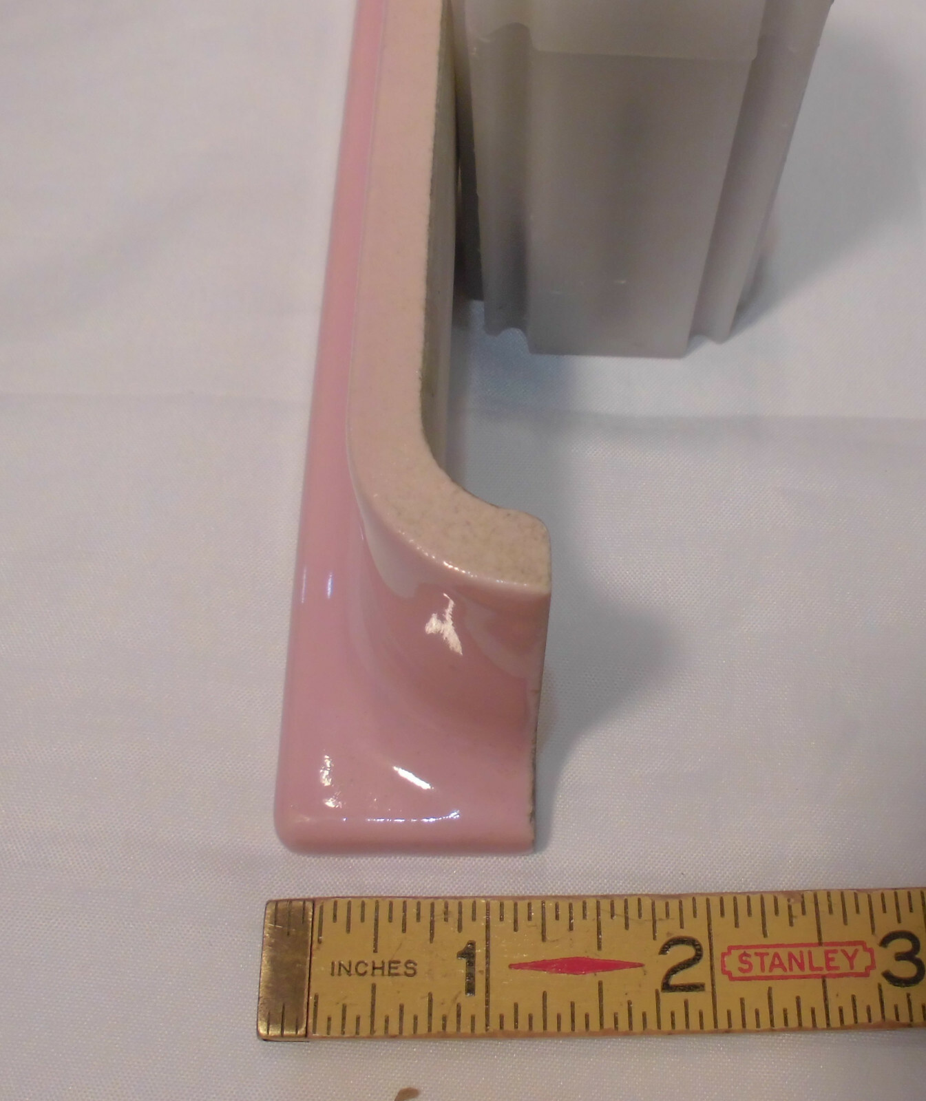 1 pc. Glossy Shell Pink 2” X 6-1/2” Ceramic Radius Cove Base Tile; Flat Top, R