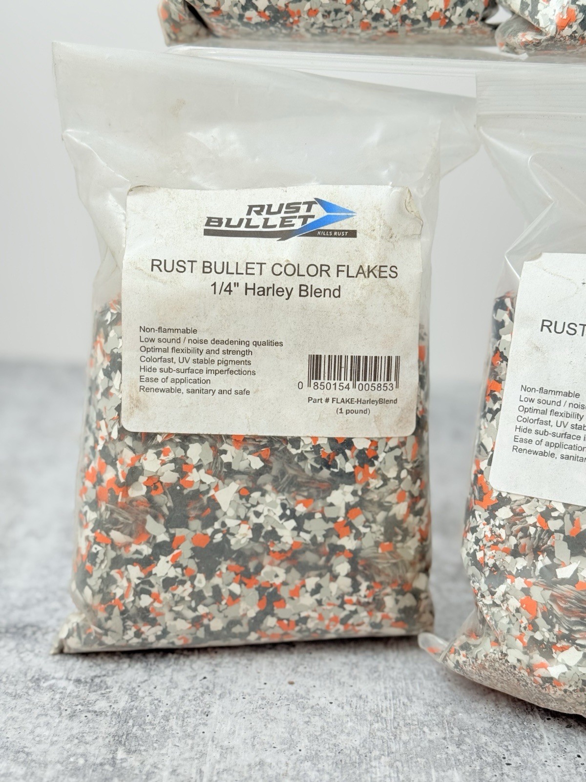 Rust Bullet Color Flake 1/4” Harley Blend Customized Concrete Floor Black Orange
