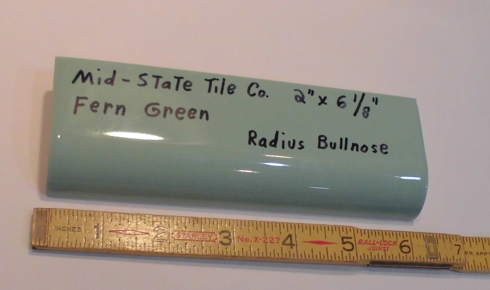 1pc. *Fern Green* Glossy Ceramic Radius Mud Cap Bullnose Tile; by Mid-State: NOS