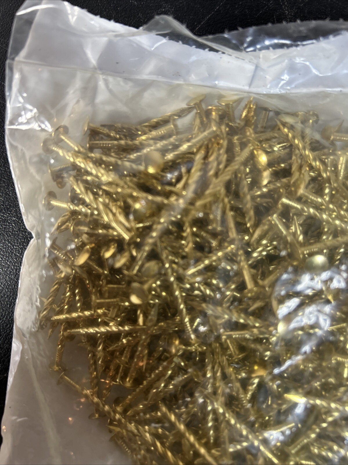 1-1/4″ Brass Coated Gold Screw Nails. 1 Lb Pack