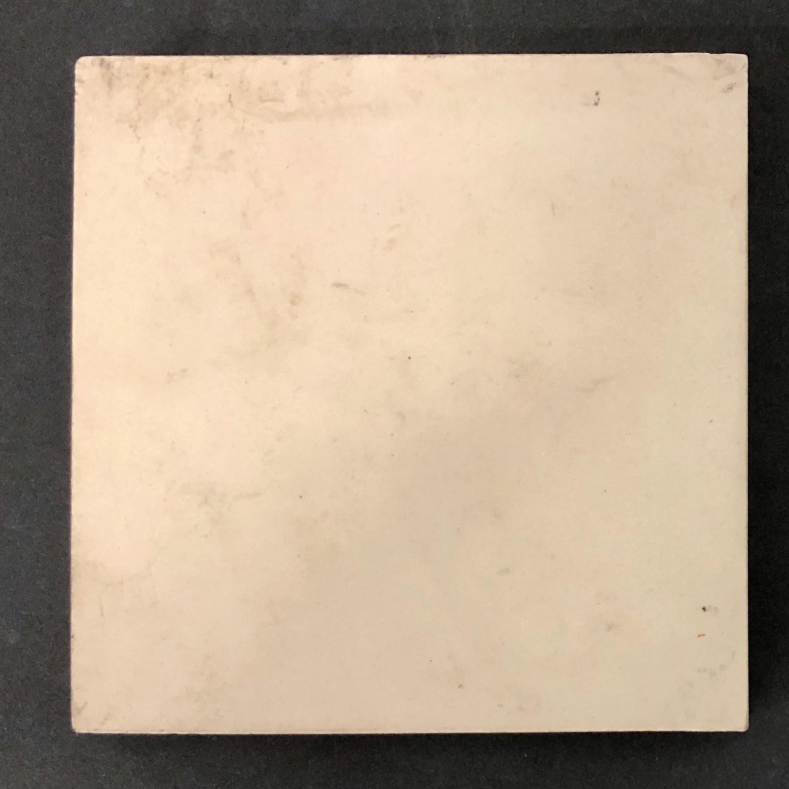 Off White Field Tile 4″ with Aztec Symbol