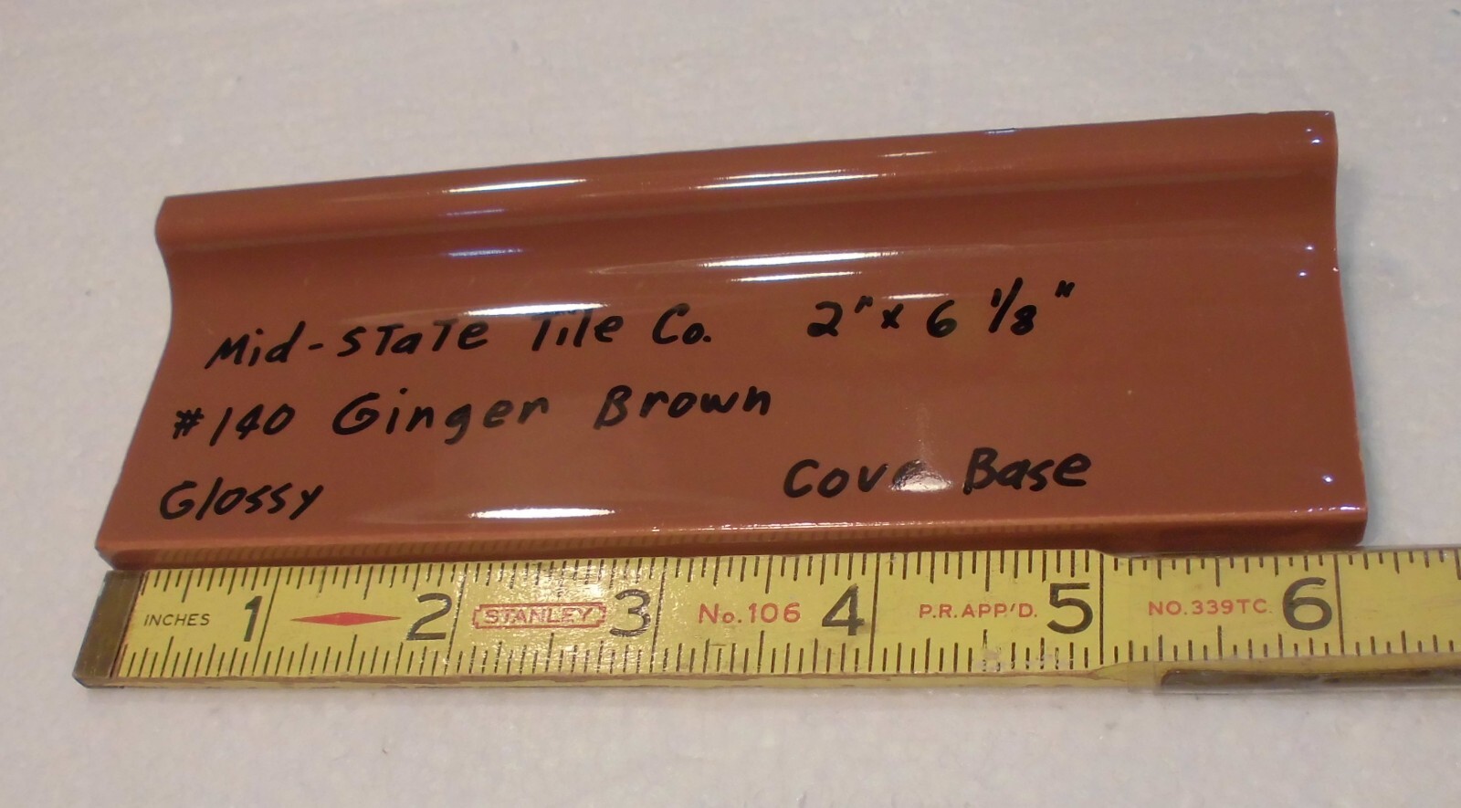 1 pc. Medium Brown: 2” X 6-1/8” Glossy Ceramic Cove Base Tile, Flat Top, NOS
