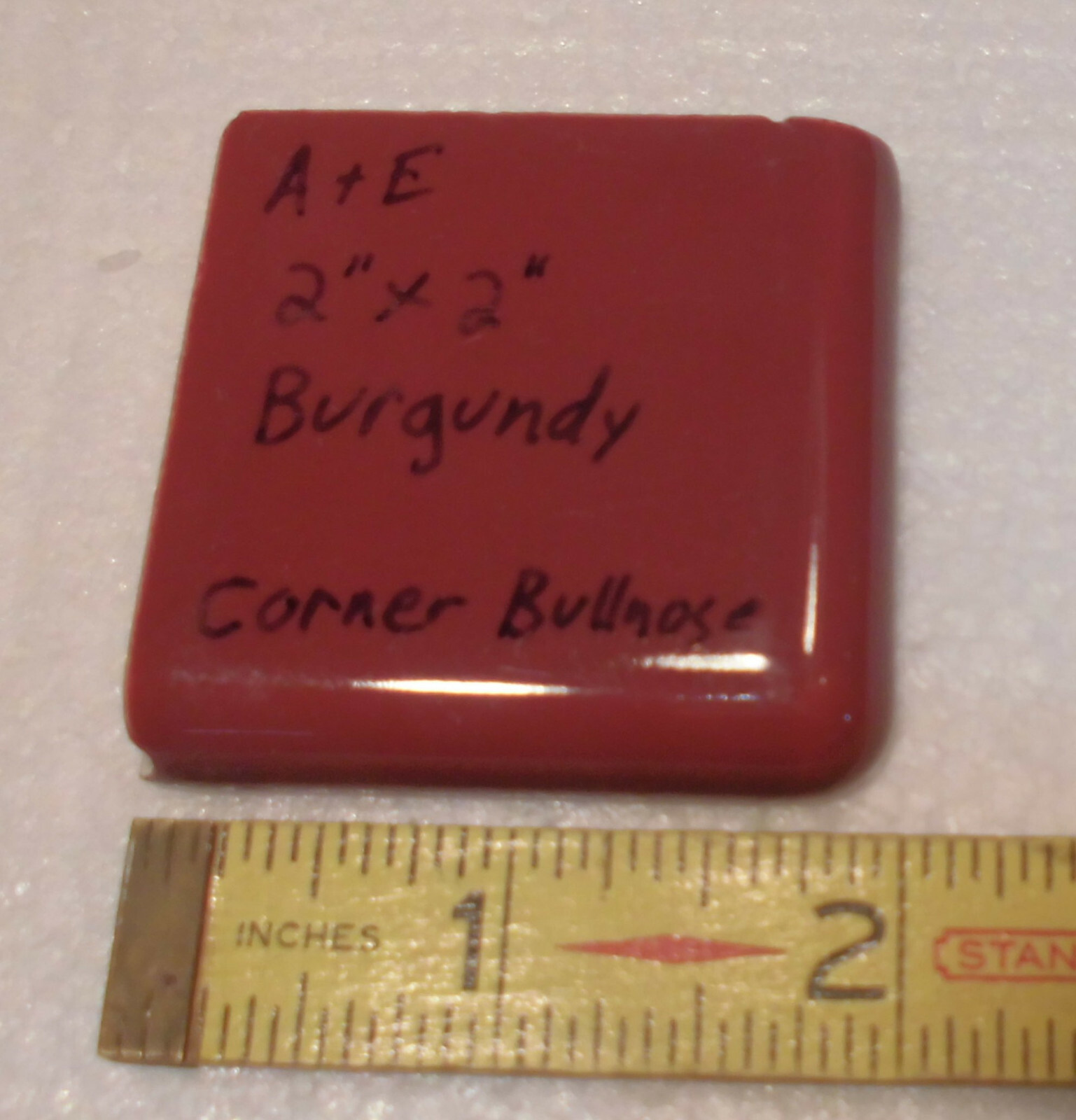 Burgundy 2″ X 2″ X 5/16″ Ceramic Surface Bullnose Corner Tile; made 1940’s