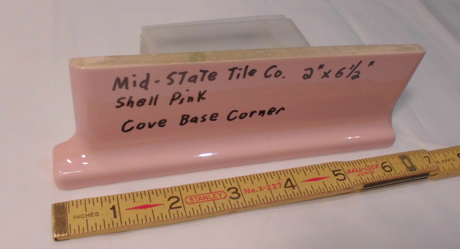 1 pc. Glossy Shell Pink 2” X 6-1/2” Ceramic Cove Base; Flat Tile; Flat Top, L
