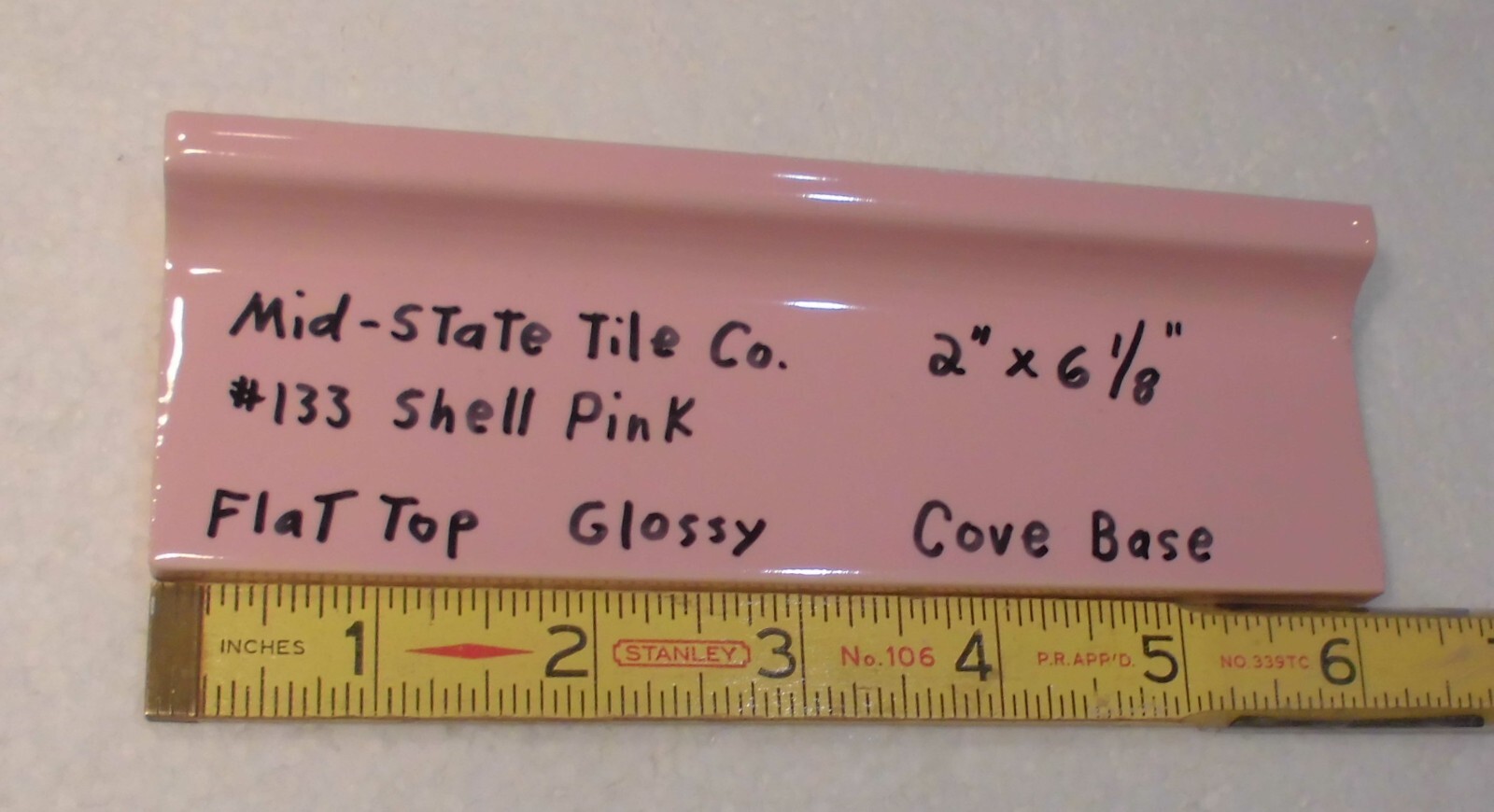 1 pc. Shell Pink 2” X 6-1/8” Glossy Ceramic Cove Base Tile, Flat Top, Mid-State