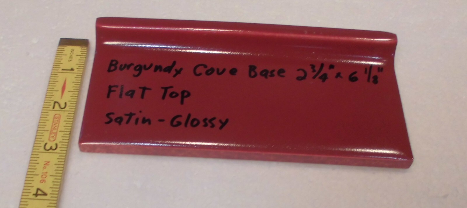 1 pc. Satin Gloss Burgundy: Flat Top base/cove Ceramic Tile: 2-3/4″ X 6-1/8″