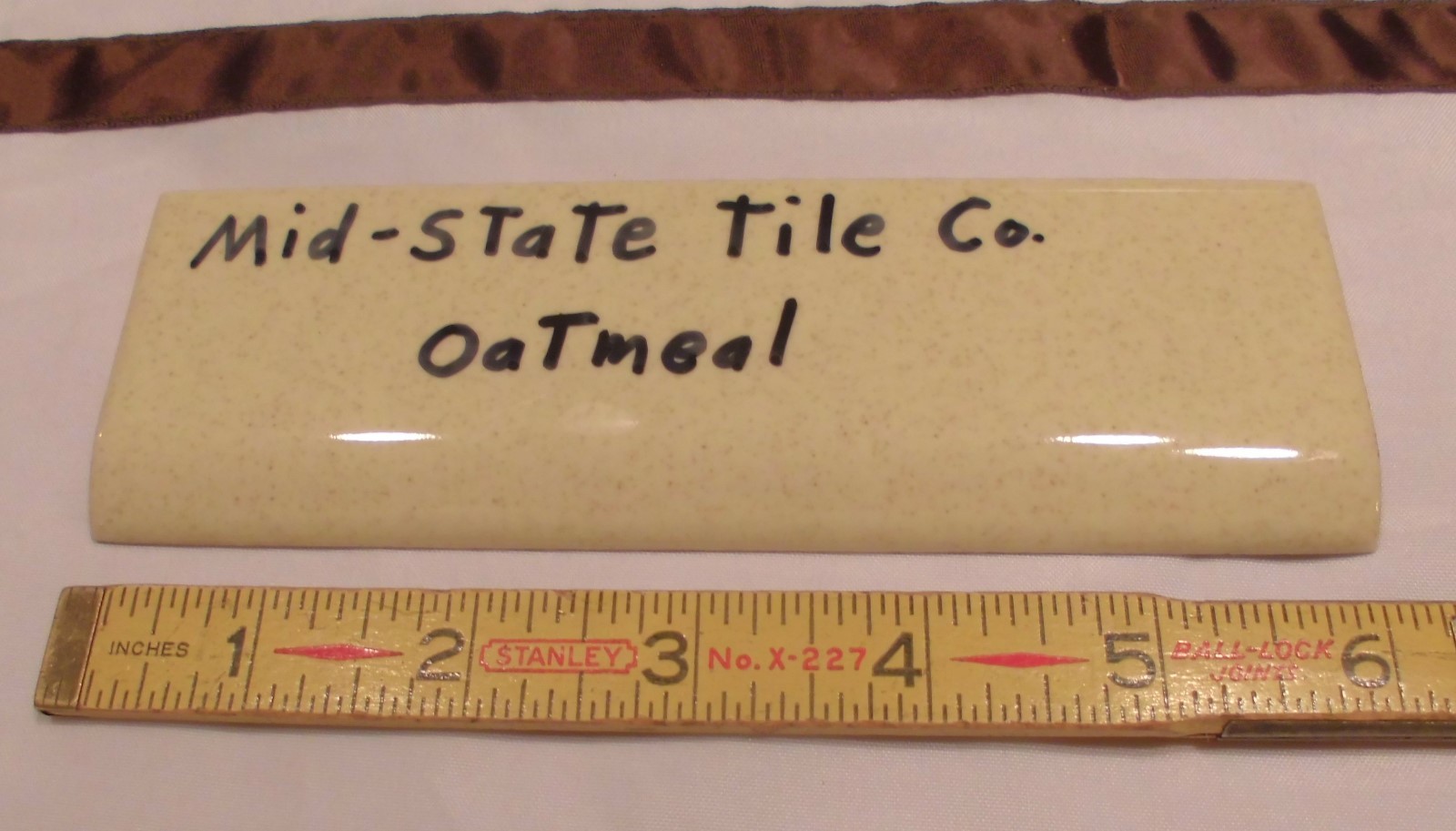 1 pc. Glossy *Oatmeal: 2” X 6-1/8” Bullnose Surface Ceramic Tile by MID-STATE