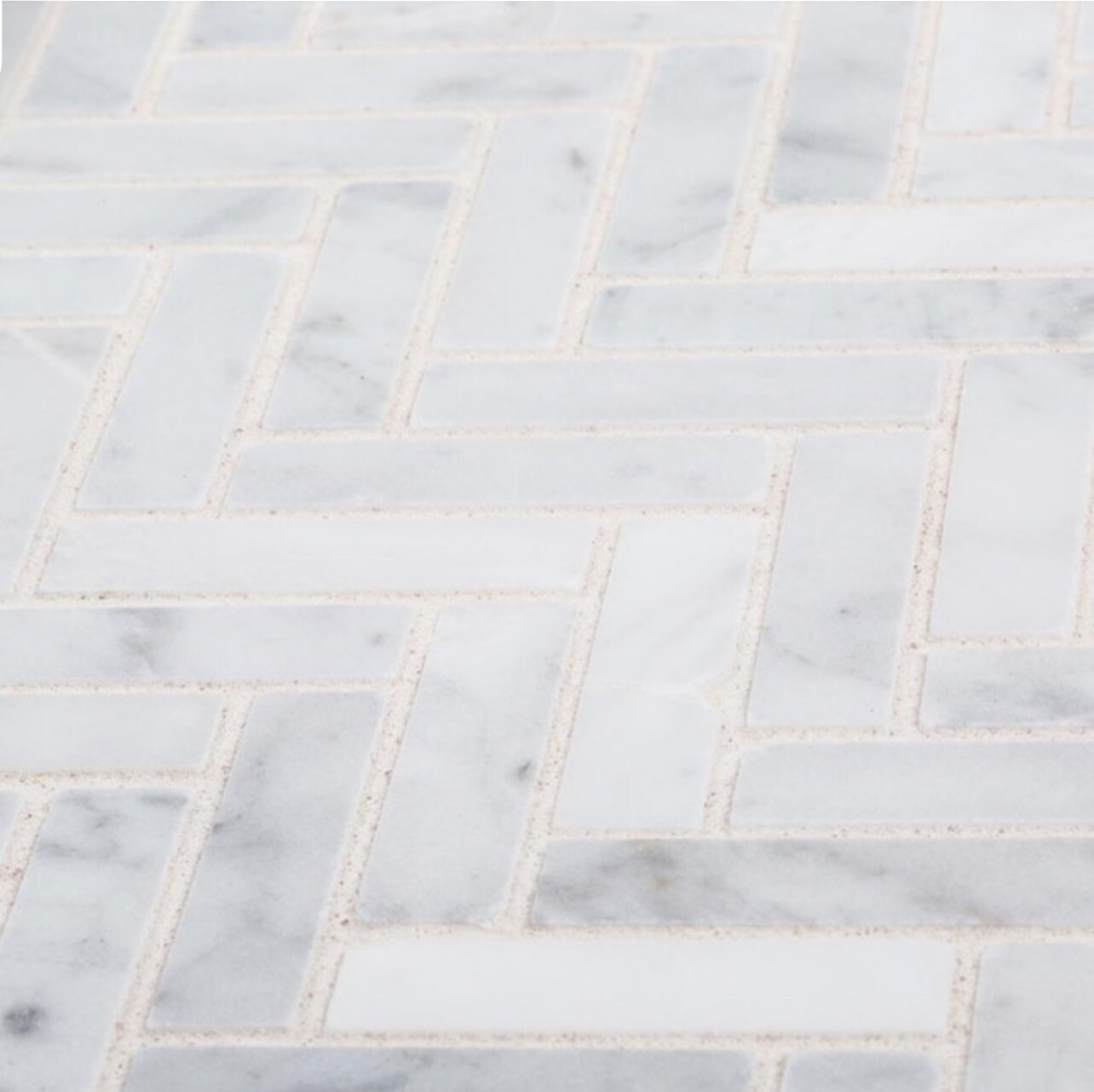 White Marble Herringbone Wall and Floor Tile