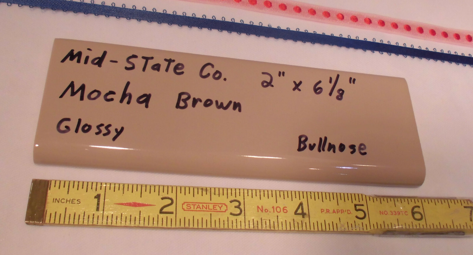 1 pc. Glossy *Mocha Brown* 2” X 6” Bullnose Surface Ceramic Tile by MID-STATE