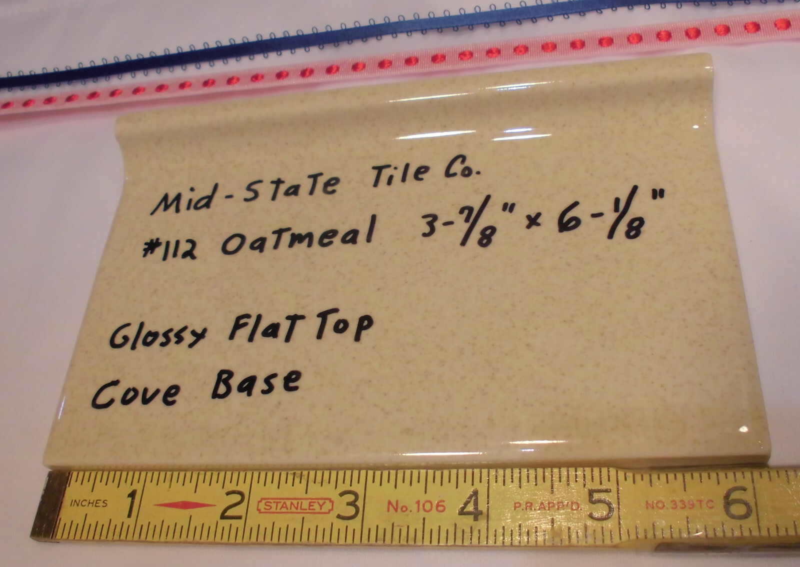 1 pc. Glossy *Oatmeal* 4” X 6” Ceramic Cove Base Tile by Mid-State, flat top