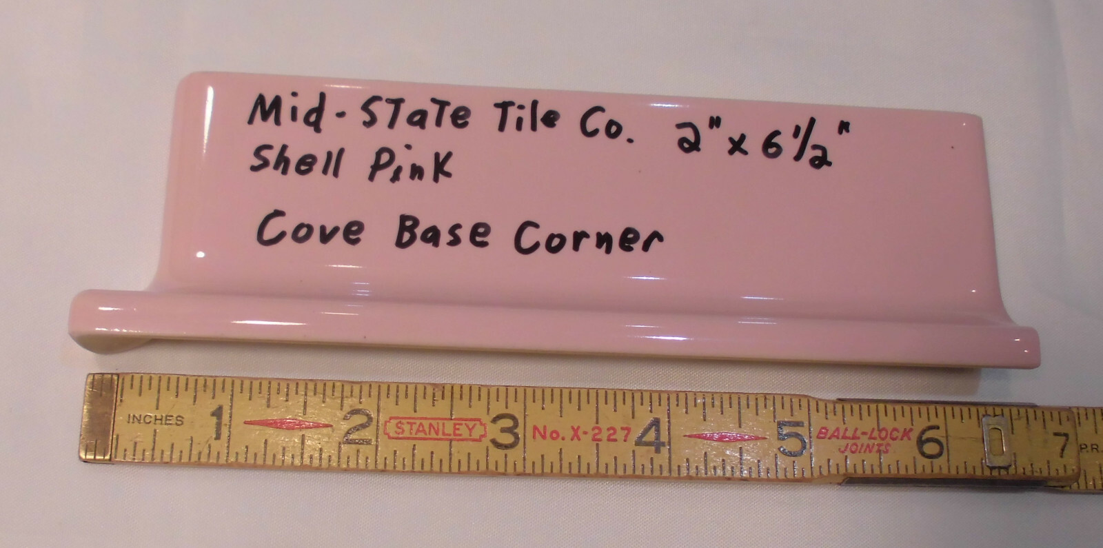 1 pc. Glossy Shell Pink 2” X 6-1/2” Ceramic Cove Base; Flat Tile; Flat Top, L