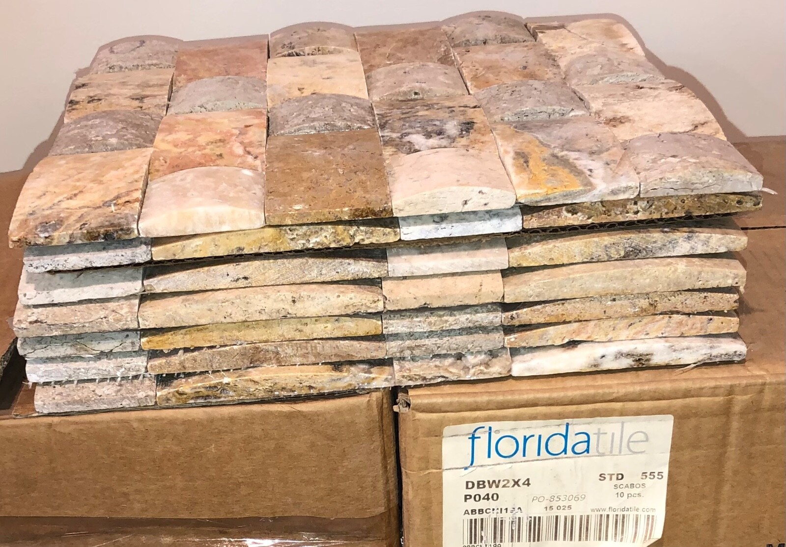 Travertine domed mosaic tile, 12”x 12”x 7/16”, from Florida Tile.