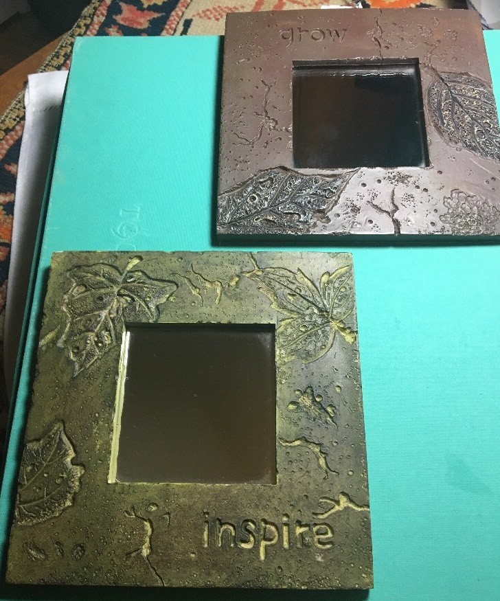 PAIR OF HAND-MADE INSPIRATIONAL SMALL ART MIRRORS; PRESSED LEAVES INTO CLAY;