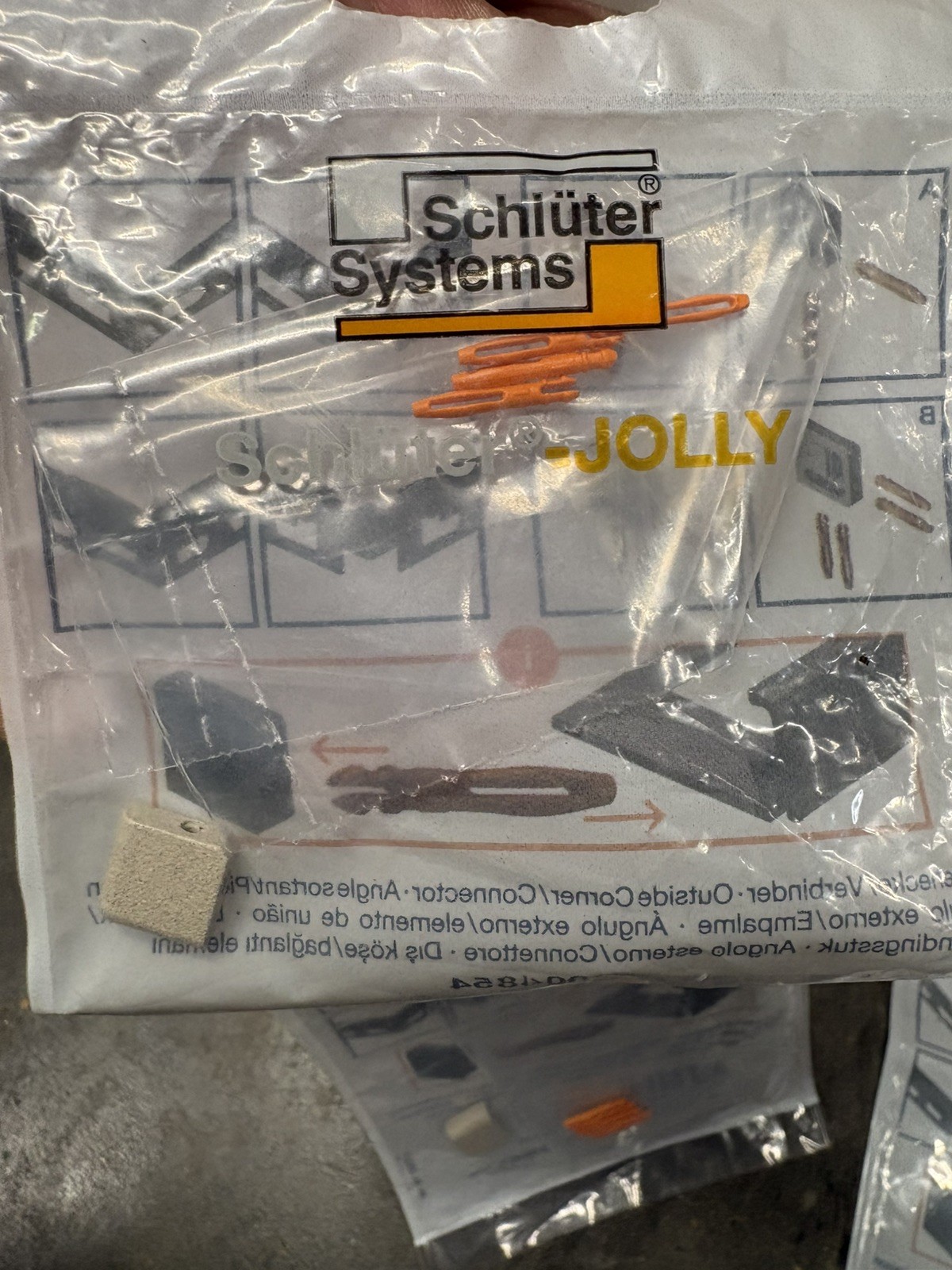 Schlüter JOLLY Tile Trim Corner Connectors for 3/8” Jolly Trim, Cream color.