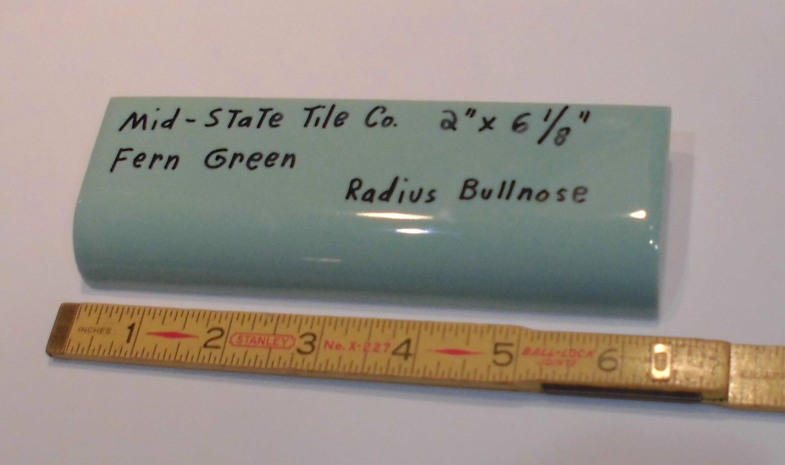 1pc. *Fern Green* Glossy Ceramic Radius Mud Cap Bullnose Tile; by Mid-State: NOS