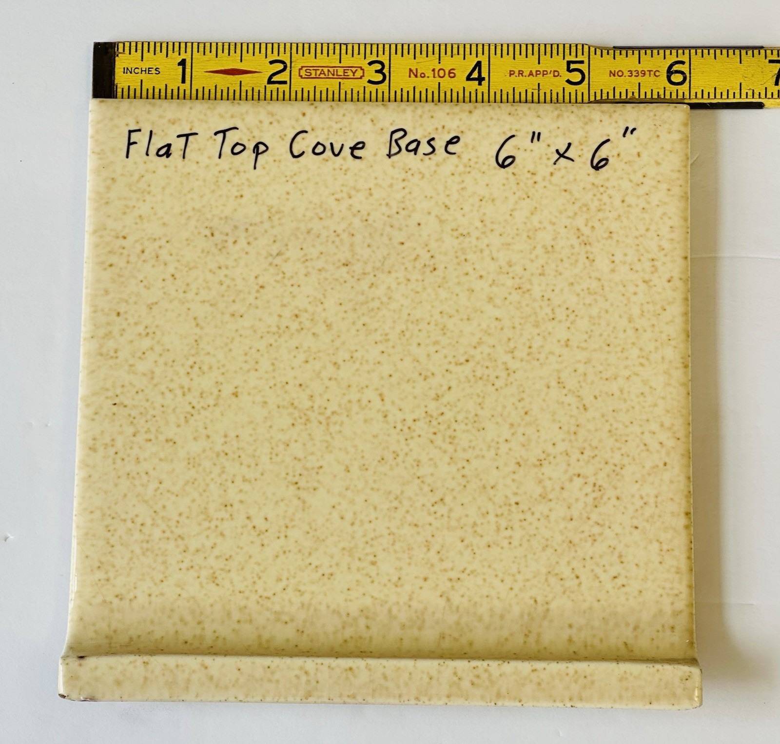 1 pc. Oatmeal Speckled Color: 6” X 6” Glossy Ceramic Cove Base Tile