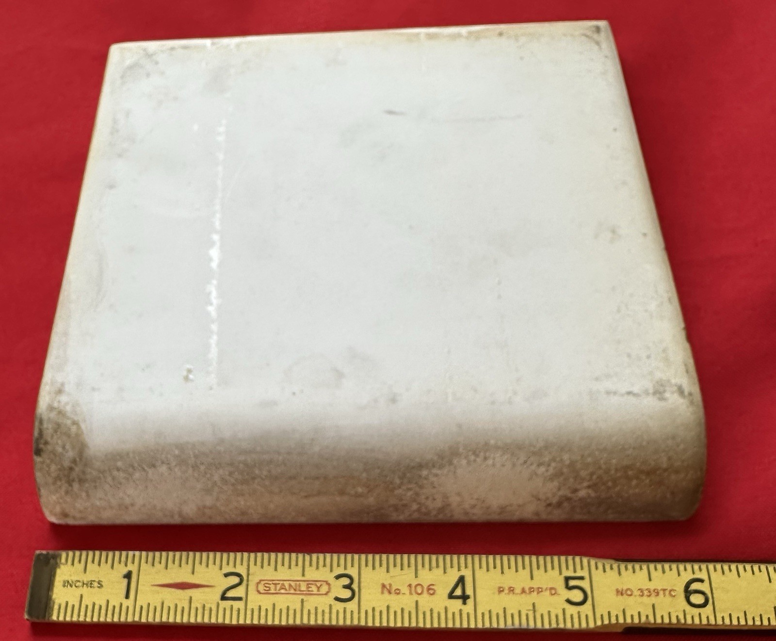 1 pc. Oatmeal Speckled Color: 6” X 6” Glossy Ceramic Cove Base Tile