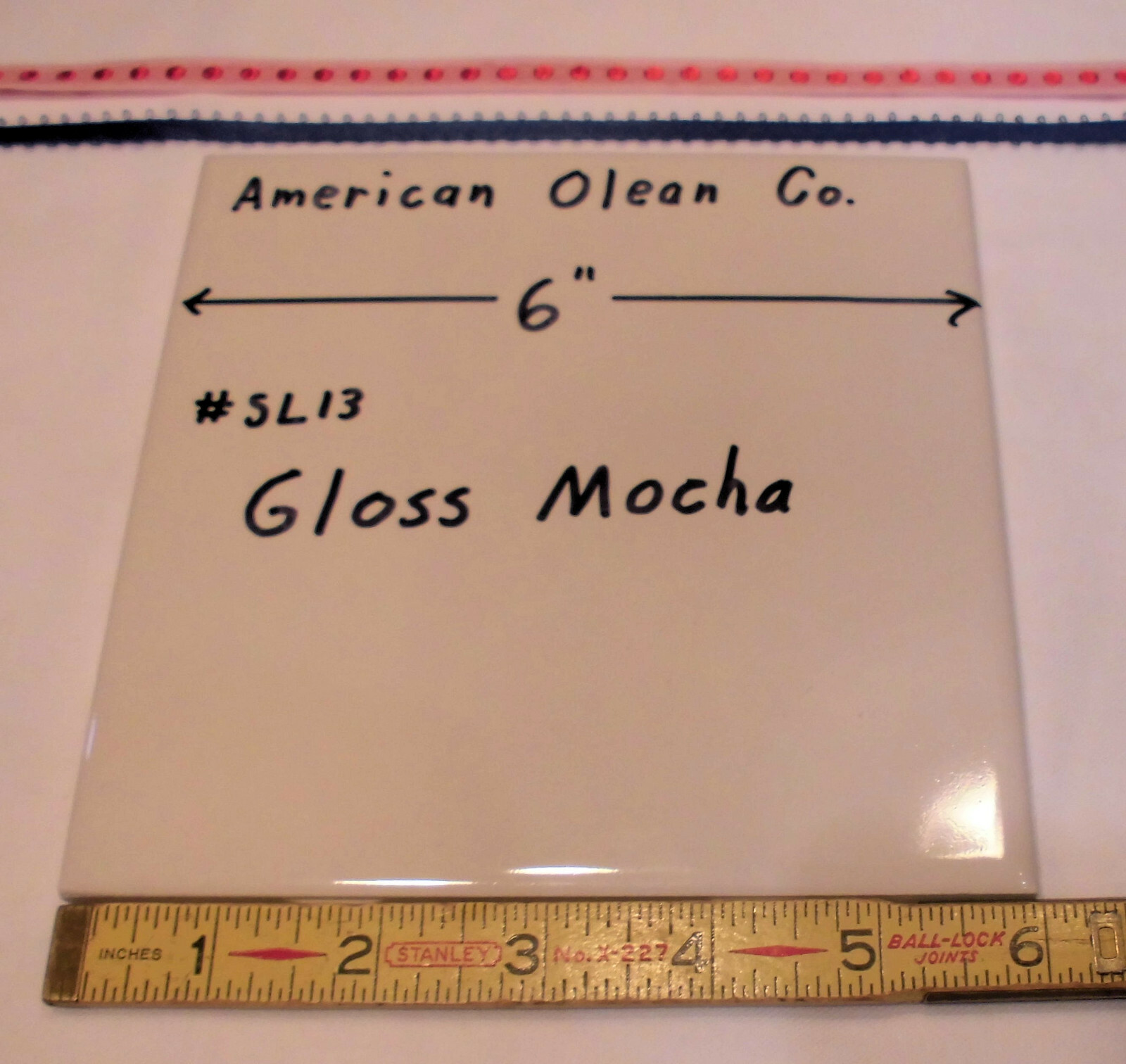 1 pc. 6″ X 6″ Ceramic Tile *Gloss Mocha #SL13* by American Olean; off-white