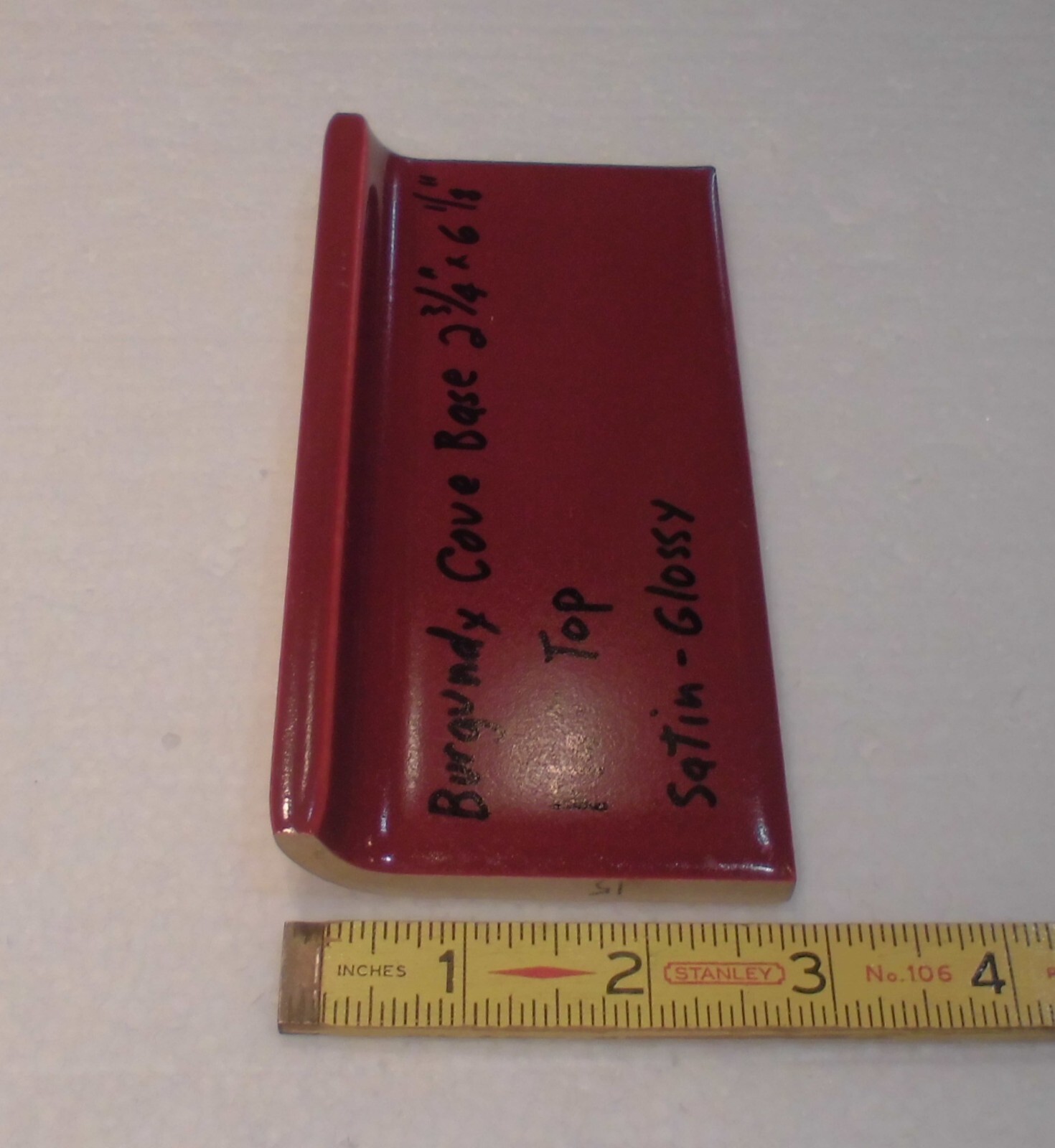 1 pc. Satin Gloss Burgundy: Flat Top base/cove Ceramic Tile: 2-3/4″ X 6-1/8″