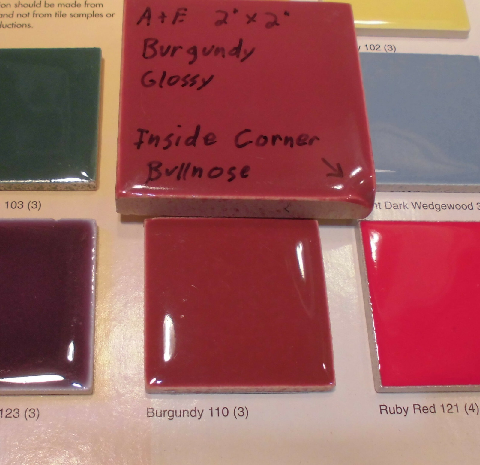 Burgundy 2″ X 2″ X 5/16″ Ceramic Surface Bullnose Inside Corner Tile; 1950’s