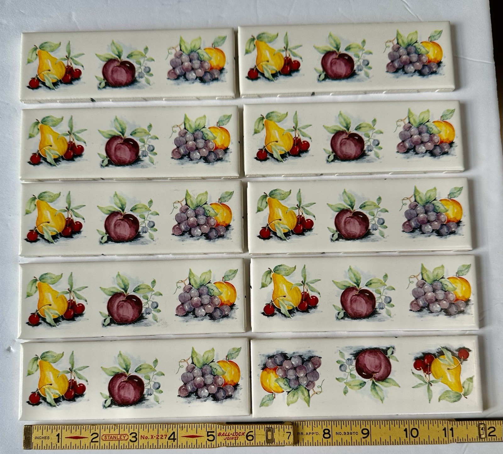 10 pieces: 2″ X 6″ Decorative Ceramic Listello Tile, Country Fruit, made USA