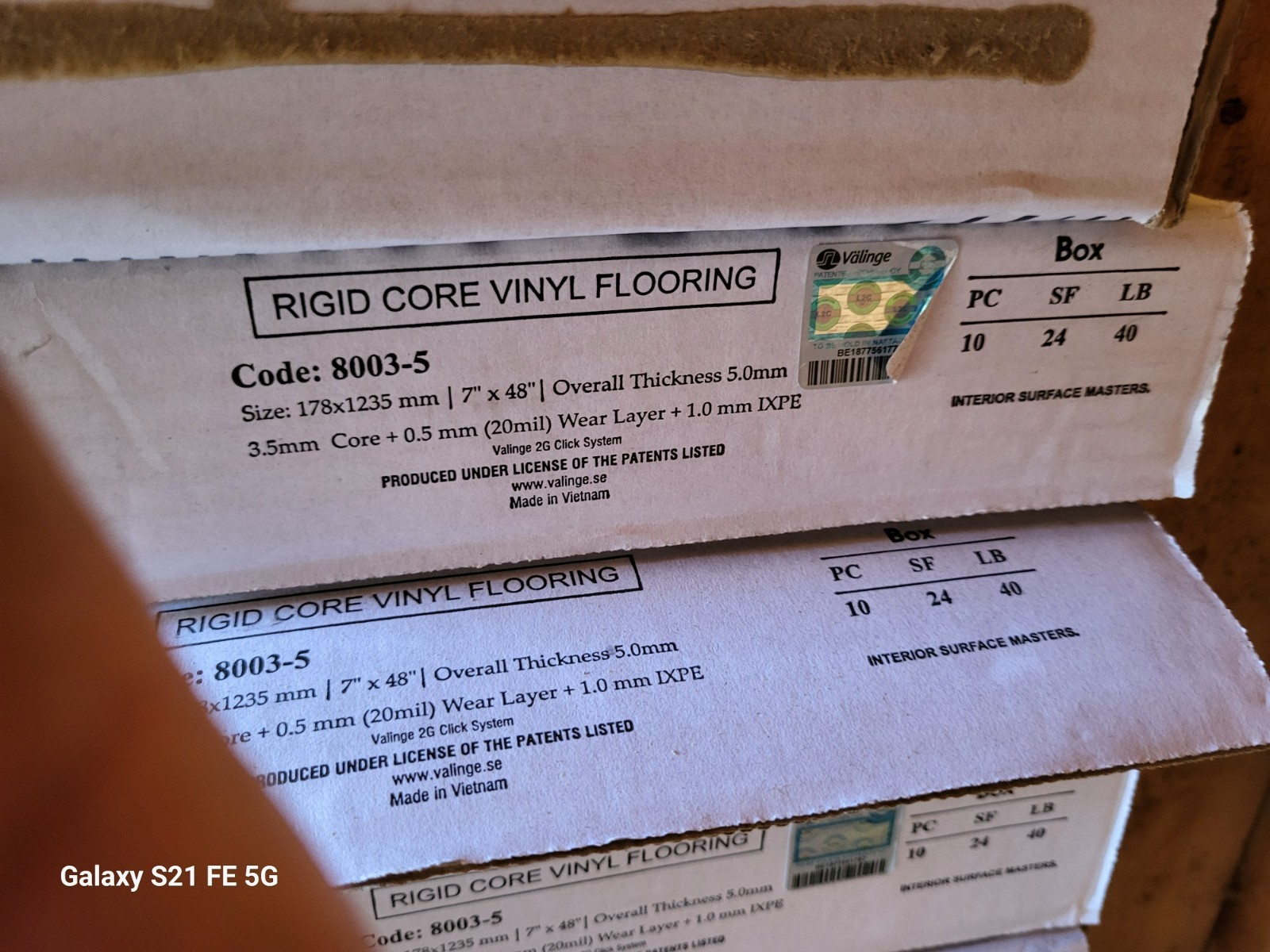 9 boxes of rigid core vinyl flooring-medium oak color, 7″ x 48″