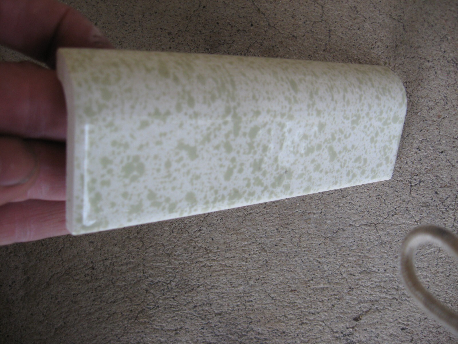 New Dal Tile Mayan Green on White Radius Bullnose Tile Bumpy Splatter Bull Nose