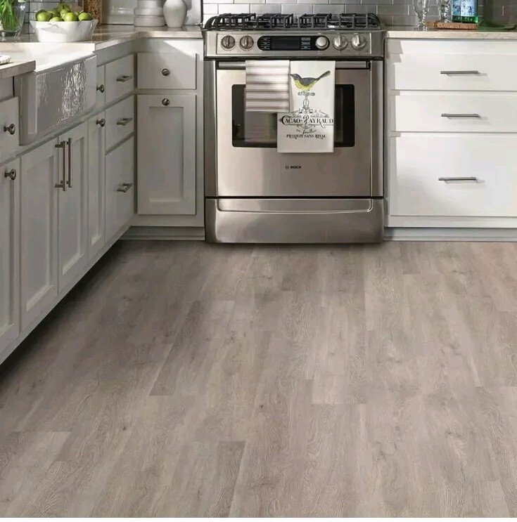 (24)TrafficMaster Plank Flooring 6″ x 36″ Peel + Stick Water Resistant Taupe Oak