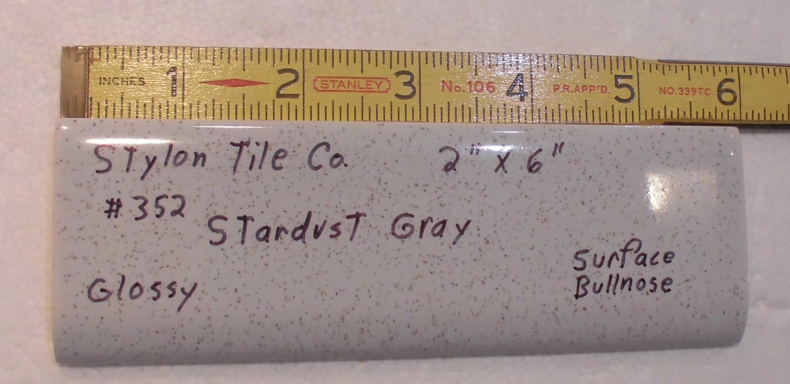 1 pc. Stardust Gray: 2” X 6” Speckled Glossy Bullnose Ceramic Tile, Stylon, Used