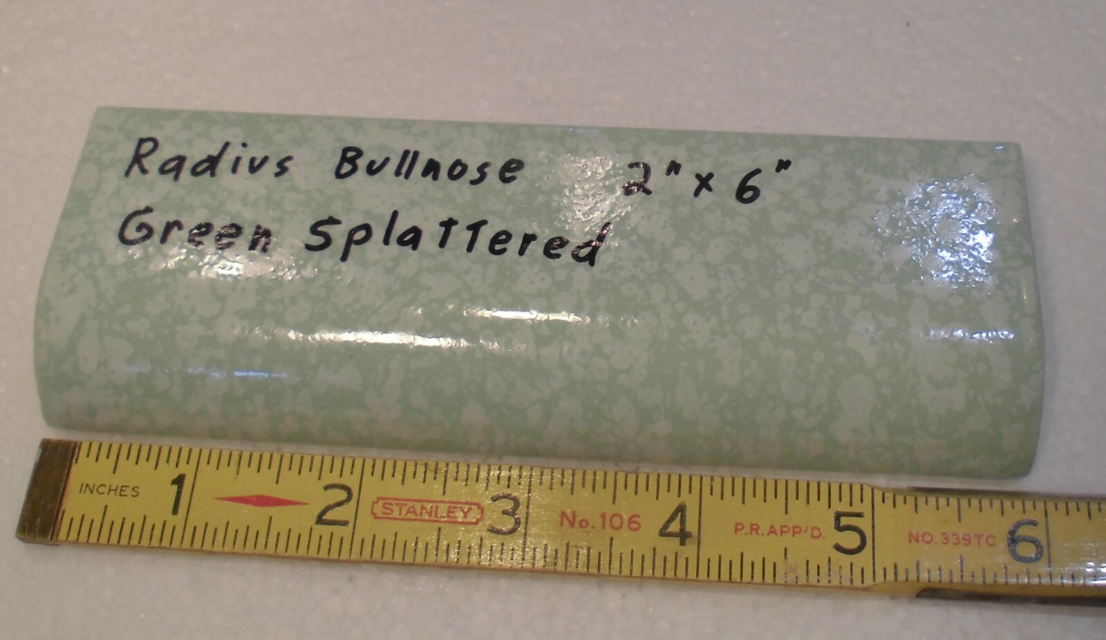 1 pc. “Pale Green Splattered” Ceramic Tile: 2″ X 6″ Glossy Radius Bullnose: NOS