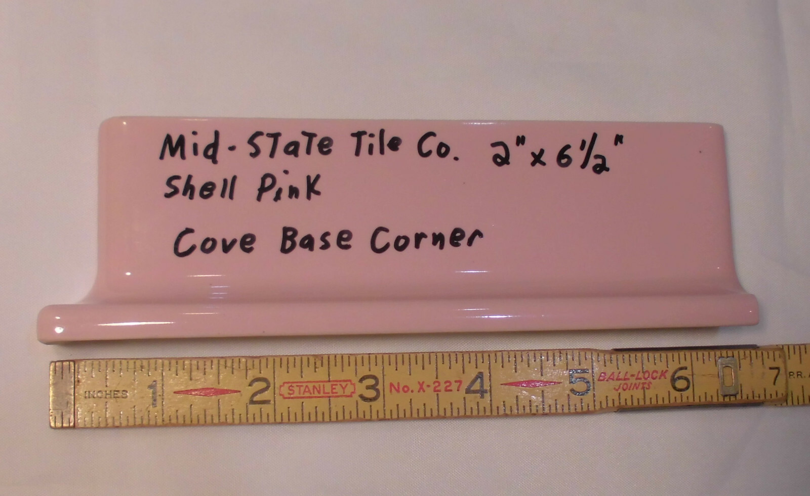 1 pc. Glossy Shell Pink 2” X 6-1/2” Ceramic Cove Base; Flat Tile; Flat Top, L
