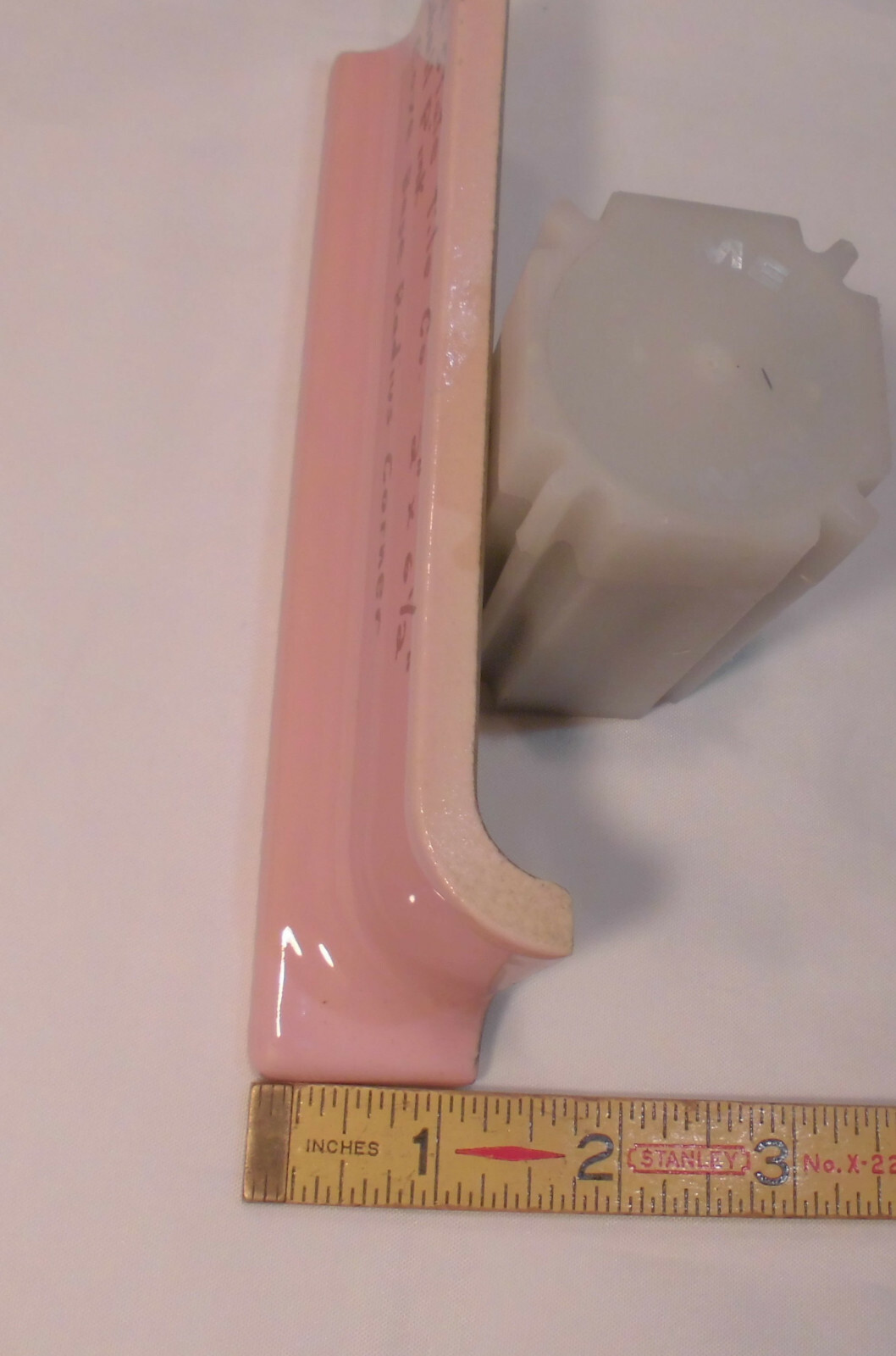 1 pc. Glossy Shell Pink 2” X 6-1/2” Ceramic Radius Cove Base Tile; Flat Top, R