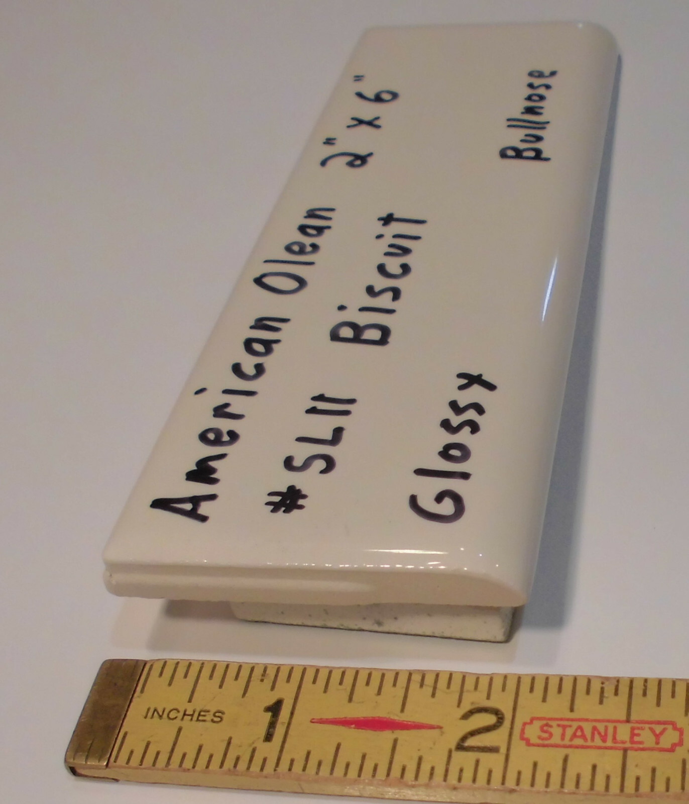 1 pc. Starting Line by American Olean; #SL11 Gloss Biscuit Bullnose Ceramic Tile
