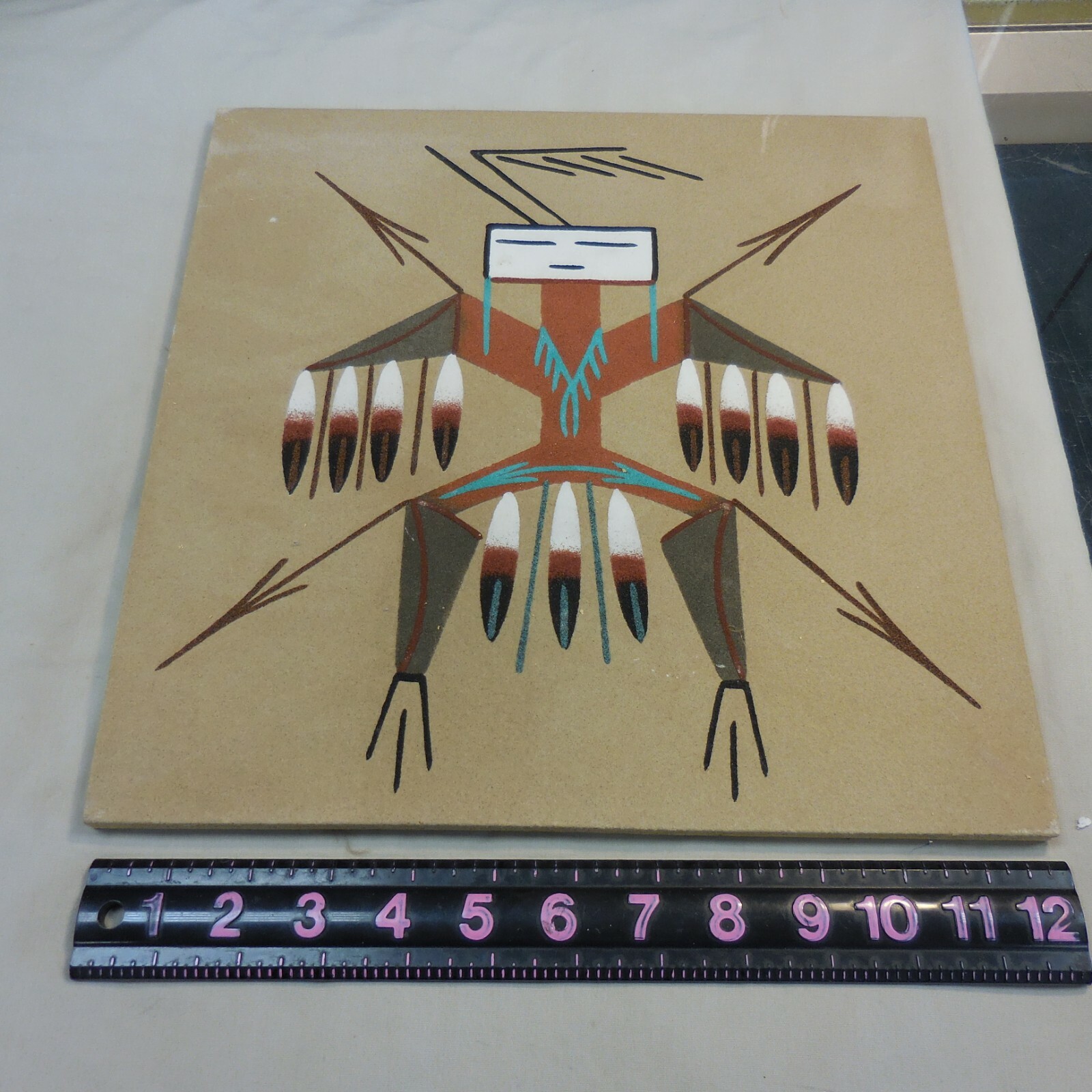 WOODEN BOARD WITH INDIAN PAINTED ARTWORK 12″ X 12″ –NOT SIGNED