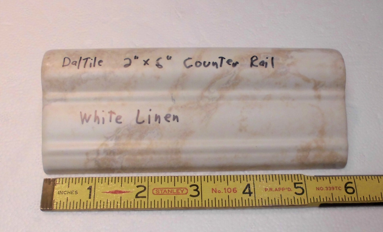 1 pc. Daltile: White Linen + Brown: V Cap Ceramic Trim Tile: Countertop-Edging