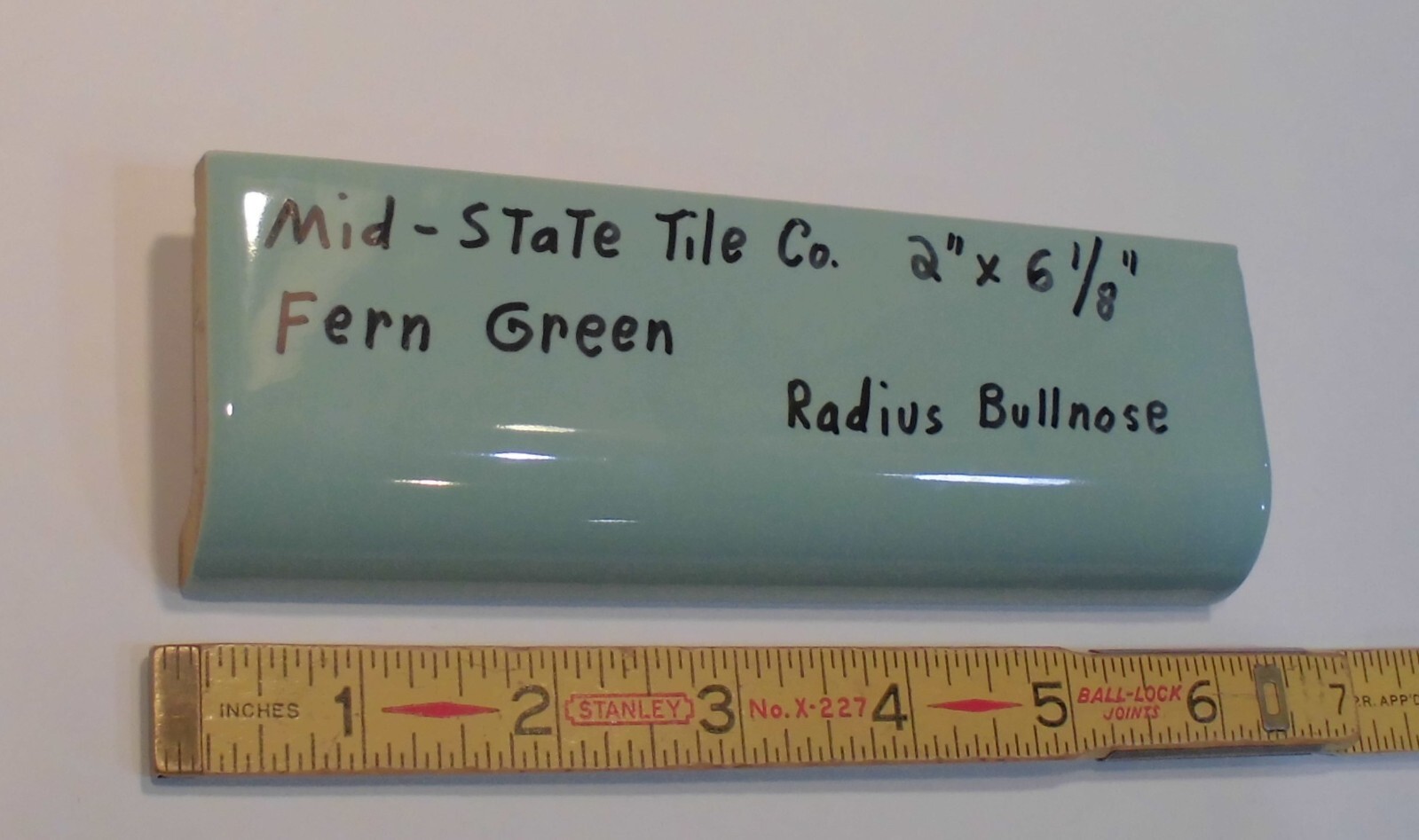 1pc. *Fern Green* Glossy Ceramic Radius Mud Cap Bullnose Tile; by Mid-State: NOS